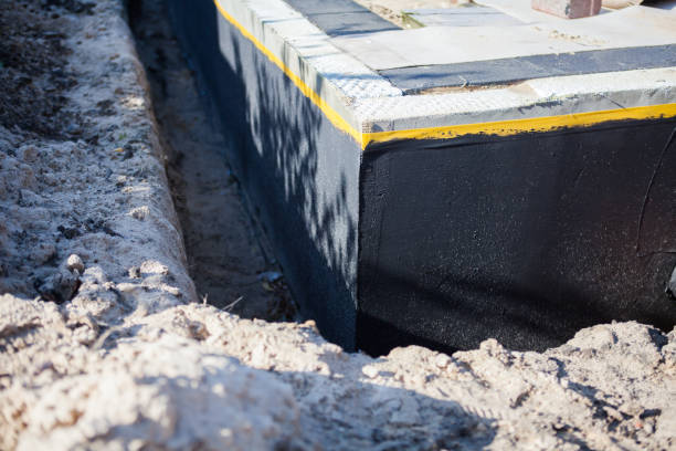 Professional Foundation Crack Repair technician working in Dale, PA